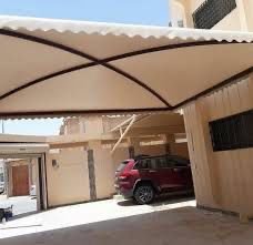 مظلات سيارات داخلية في جازان لحماية المركبات من العوامل البيئية.